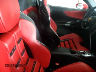 2024 Ferrari SF90 z VIN ZFF96NMAXR0307213, wystawiony jako Copart lot #74306594 z przebiegiem Nie podano mil oraz Nie do naprawy. Historia ofert i sprzedaży dostępna na DreamBid. Obrazek 10.