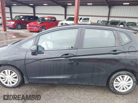 2015 Honda Fit LX with VIN 3HGGK5H56FM760513, listed as a IAAI auction lot 42431169 with 69,841 mi miles and . Bid and sale history available at DreamBid. Image 15.