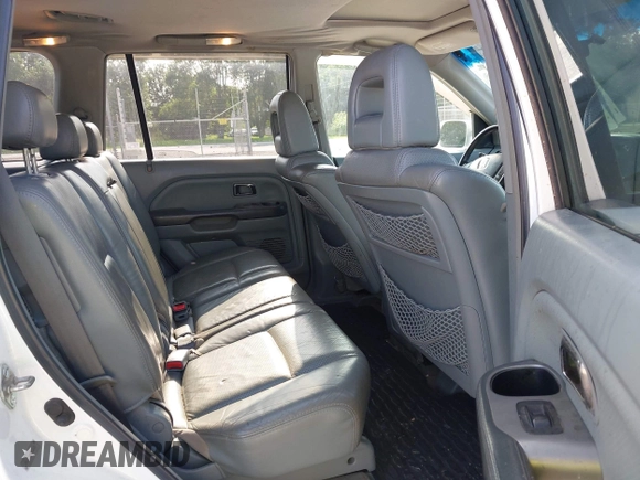 2005 Honda Pilot EX-L with VIN 5FNYF185X5B012415, listed as a IAAI auction lot 42395828 with 246,342 mi miles and . Bid and sale history available at DreamBid. Image 8.