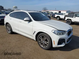 2021 BMW X4 xDrive30i z VIN 5UX2V1C01M9F26524, wystawiony jako IAAI lot #41805153 z przebiegiem 40 353 mil mil oraz . Historia ofert i sprzedaży dostępna na DreamBid. Obrazek 1.