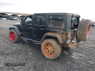 2018 Jeep Wrangler JK Unlimited Rubicon Recon with VIN 1C4BJWFG9JL844051, listed as a IAAI auction lot 40923174 with 64,309 mi miles. Bid and sale history available at carsss.com. Image 3.