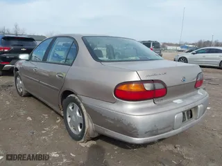 2000 Chevrolet Malibu LS with VIN 1G1NE52JXY6160219, listed as a IAAI auction lot 41806027 with 139,790 mi miles. Bid and sale history available at carsss.com. Image 3.