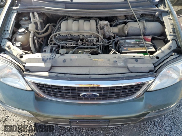 2003 Ford Windstar LTD z VIN 2FMDA584X3BA26817, wystawiony jako Copart lot #74730094 z przebiegiem 87 655 mil mil oraz Czysty tytuł • Clean title. Historia ofert i sprzedaży dostępna na DreamBid. Obrazek 12.