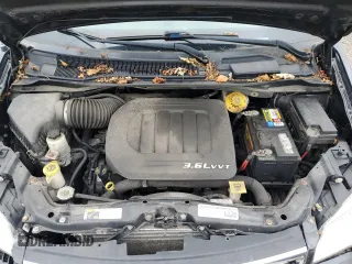 2015 Chrysler Town & Country Touring with VIN 2C4RC1BG7FR560689, listed as a Copart auction lot 61602544 with 117,441 mi miles and Salvage Title. Bid and sale history available at DreamBid. Image 12.