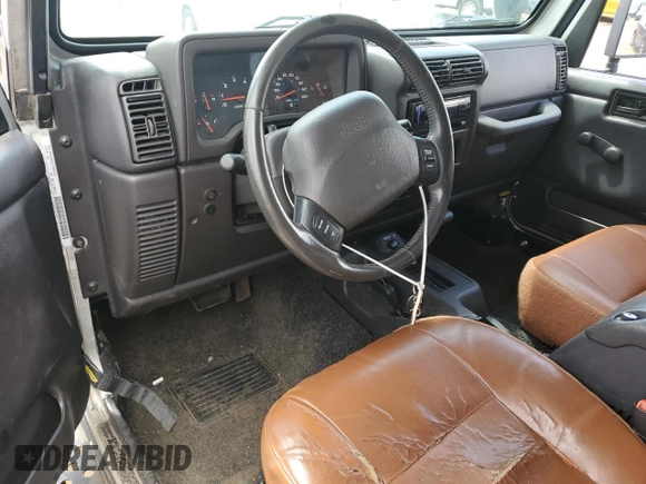 2002 Jeep Wrangler X с VIN 1J4FA39S52P770423, выставлен на аукционе Copart как лот 62498885 с пробегом 87 433 миль миль и Чистый • Clean title. История ставок и продаж доступна на DreamBid. Изображение 8.