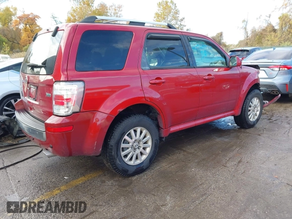 2010 Mercury Mariner Premier with VIN 4M2CN9HG5AKJ06111, listed as a IAAI auction lot 40740774 with 98,607 mi miles and . Bid and sale history available at DreamBid. Image 4.