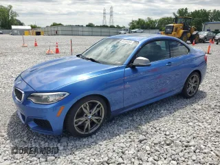 2015 BMW 2 Series M235i xDrive with VIN WBA1J9C57FVX99068, listed as a Copart auction lot 58204484 with 127,706 mi miles. Bid and sale history available at carsss.com. Image 1.