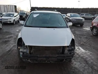 2007 Kia Sedona LX with VIN KNDMB233976172127, listed as a IAAI auction lot 41557356 with 164,383 mi miles. Bid and sale history available at carsss.com. Image 12.