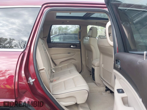 2019 Jeep Grand Cherokee High Altitude z VIN 1C4RJFCT3KC621988, wystawiony jako IAAI lot #41984172 z przebiegiem 40 990 mil mil oraz . Historia ofert i sprzedaży dostępna na DreamBid. Obrazek 8.