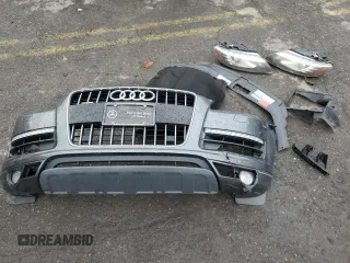 2014 Audi Q7 Premium Plus with VIN WA1LMAFE8ED015737, listed as a Copart auction lot 62099545 with 129,505 mi miles and Salvage title. Bid and sale history available at DreamBid. Image 13.