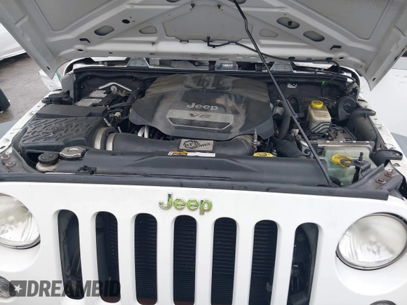 2014 Jeep Wrangler Unlimited Rubicon with VIN 1C4HJWFG4EL104827, listed as a IAAI auction lot 42236622 with 90,935 mi miles and . Bid and sale history available at DreamBid. Image 10.