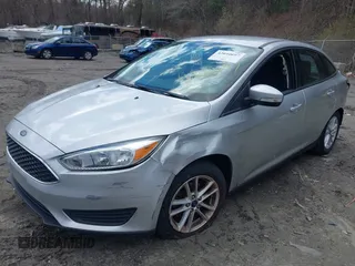 2017 Ford Focus SE with VIN 1FADP3F25HL335102, listed as a IAAI auction lot 42010697 with 77,389 mi miles. Bid and sale history available at carsss.com. Image 2.