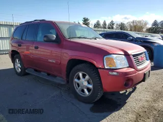 2004 GMC Envoy SLT with VIN 1GKDT13S542243359, listed as a Copart auction lot 79068994 with 199,062 mi miles and Salvage Title. Bid and sale history available at carsss.com. Image 4.