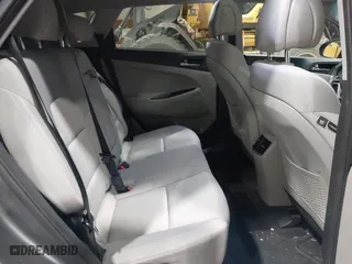 2018 Hyundai Tucson Value with VIN KM8J3CA22JU688957, listed as a IAAI auction lot 41868195 with 117,256 mi miles. Bid and sale history available at carsss.com. Image 8.