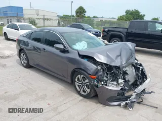 2017 Honda Civic LX z VIN 19XFC2F55HE032090, wystawiony jako IAAI lot #42357720 z przebiegiem 53 101 mil mil oraz . Historia ofert i sprzedaży dostępna na DreamBid. Obrazek 1.