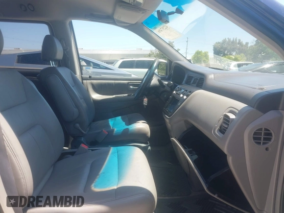 2003 Honda Odyssey EX-L z VIN 5FNRL189X3B151554, wystawiony jako IAAI lot #42297496 z przebiegiem 172 719 mil mil oraz . Historia ofert i sprzedaży dostępna na DreamBid. Obrazek 5.