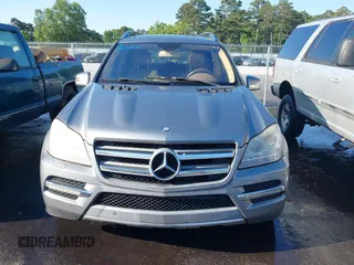 2012 Mercedes-Benz GL 450 z VIN 4JGBF7BE5CA764218, wystawiony jako IAAI lot #42349351 z przebiegiem 196 127 mil mil oraz . Historia ofert i sprzedaży dostępna na DreamBid. Obrazek 12.