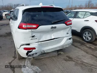 2018 Jeep Cherokee Overland with VIN 1C4PJMJX7JD594319, listed as a IAAI auction lot 41177860 with 128,925 mi miles. Bid and sale history available at carsss.com. Image 6.