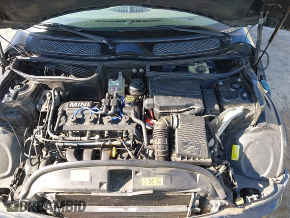 2002 MINI Hardtop with VIN WMWRC33402TC32985, listed as a IAAI auction lot 42608636 with 159,996 mi miles and . Bid and sale history available at DreamBid. Image 10.
