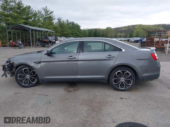 2014 Ford Taurus SHO with VIN 1FAHP2KTXEG160800, listed as a IAAI auction lot 42083237 with 75,048 mi miles. Bid and sale history available at carsss.com. Image 15.