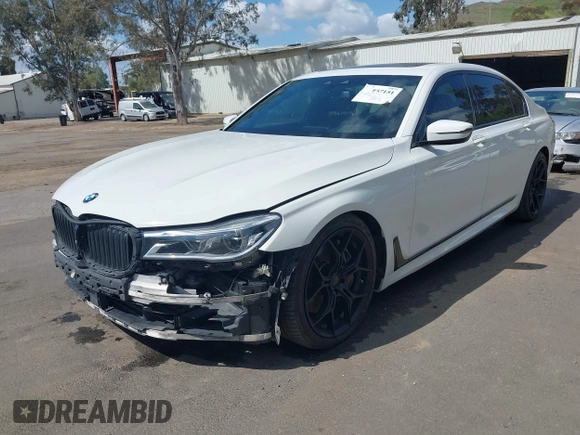 2017 BMW 7 Series 750i with VIN WBA7F0C32HGM22273, listed as a IAAI auction lot 41857151 with 90,518 mi miles and . Bid and sale history available at carsss.com. Image 18.