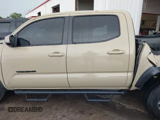 2020 Toyota Tacoma SR5 with VIN 5TFCZ5AN7LX231676, listed as a IAAI auction lot 42596728 with 101,362 mi miles and . Bid and sale history available at DreamBid. Image 14.