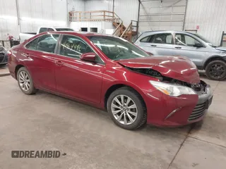 2015 Toyota Camry LE z VIN 4T1BD1FKXFU162954, wystawiony jako IAAI lot #41964496 z przebiegiem 151 540 mil mil oraz . Historia ofert i sprzedaży dostępna na DreamBid. Obrazek 1.
