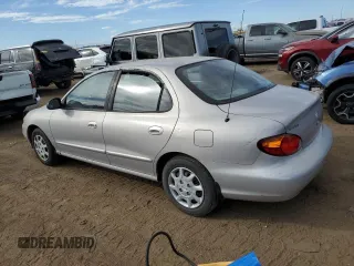 1999 Hyundai Elantra z VIN KMHJF25F8XU852123, wystawiony jako Copart lot #72284584 z przebiegiem 12 750 mil mil oraz Czysty tytuł • Clean title. Historia ofert i sprzedaży dostępna na DreamBid. Obrazek 2.