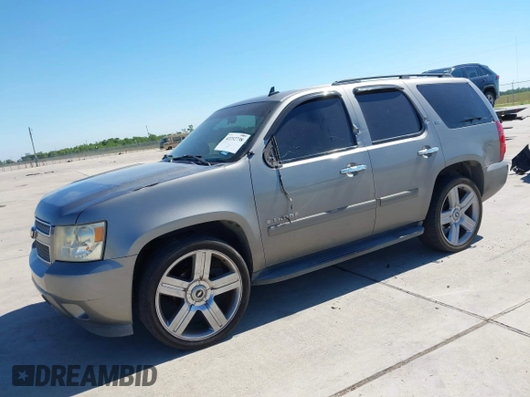 2008 Chevrolet Tahoe 3LT with VIN 1GNFC13018R154833, listed as a IAAI auction lot 42232738 with 243,993 mi miles and . Bid and sale history available at DreamBid. Image 2.