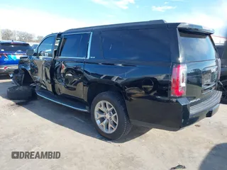 2016 GMC Yukon XL SLE with VIN 1GKS1FKC9GR442107, listed as a IAAI auction lot 41309092 with 130,117 mi miles. Bid and sale history available at carsss.com. Image 3.