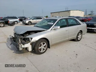 2002 Toyota Avalon XL z VIN 4T1BF28B22U200555, wystawiony jako Copart lot #54544265 z przebiegiem 146 031 mil mil oraz Tytuł czysty. Historia ofert i sprzedaży dostępna na DreamBid. Obrazek 1.