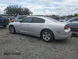 2012 Dodge Charger SE with VIN 2C3CDXBG4CH203207, listed as a Copart auction lot 69533004 with 156,015 mi miles and Salvage Title. Bid and sale history available at DreamBid. Image 2.