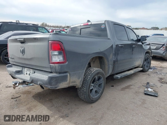 2021 Ram 1500 Lone Star with VIN 1C6RREFT2MN746770, listed as a IAAI auction lot 41360600 with 76,998 mi miles and . Bid and sale history available at DreamBid. Image 4.