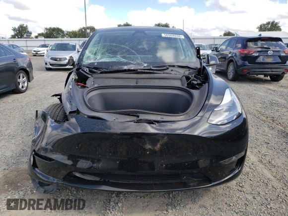 2024 Tesla Model Y Long Range с VIN 7SAYGAEE6RF127846, выставлен на аукционе Copart как лот 56968035 с пробегом 23 328 миль миль и Списание • Salvage title. История ставок и продаж доступна на DreamBid. Изображение 5.