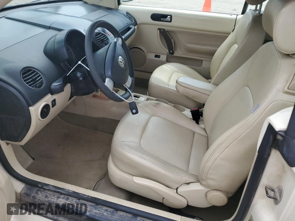 2007 Volkswagen Beetle z VIN 3VWRF31Y97M422610, wystawiony jako Copart lot #58707345 z przebiegiem 55 486 mil mil oraz Szkoda całkowita • Salvage title. Historia ofert i sprzedaży dostępna na DreamBid. Obrazek 7.