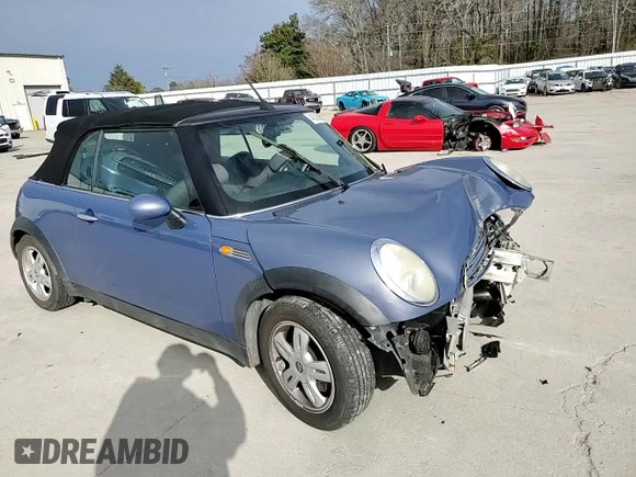 2005 MINI Convertible with VIN WMWRF33555TF62593, listed as a Copart auction lot 48305985 with 172,839 mi miles and Salvage title. Bid and sale history available at DreamBid. Image 11.