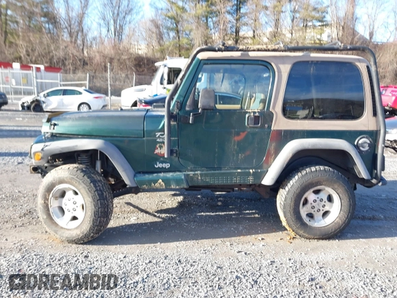 2000 Jeep Wrangler Sahara with VIN 1J4FA59S0YP724521, listed as a IAAI auction lot 41574689 with 167,584 mi miles. Bid and sale history available at carsss.com. Image 14.