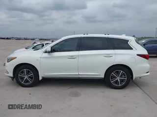 2016 Infiniti QX60 with VIN 5N1AL0MNXGC532149, listed as a IAAI auction lot 42034650 with 124,126 mi miles and . Bid and sale history available at DreamBid. Image 14.
