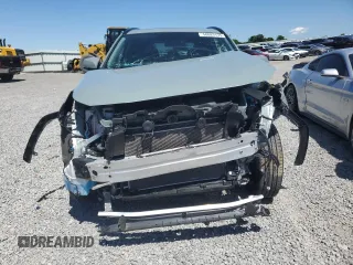2023 Toyota RAV4 Hybrid XLE z VIN JTMRWRFV8PD206165, wystawiony jako Copart lot #58083135 z przebiegiem 27 023 mil mil oraz Szkoda całkowita • Salvage title. Historia ofert i sprzedaży dostępna na DreamBid. Obrazek 5.