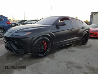 2019 Lamborghini Urus z VIN ZPBUA1ZL2KLA05616, wystawiony jako Copart lot #76865444 z przebiegiem 67 830 mil mil oraz Nie do naprawy. Historia ofert i sprzedaży dostępna na DreamBid. Obrazek 1.