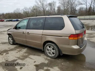 2004 Honda Odyssey EX with VIN 5FNRL186X4B127827, listed as a Copart auction lot 51602565 with 182,127 mi miles and Salvage Title. Bid and sale history available at DreamBid. Image 2.