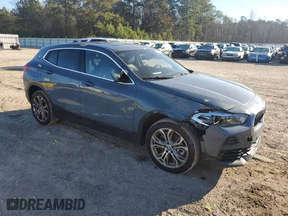 2022 BMW X2 xDrive28i with VIN WBXYJ1C0XN5T67566, listed as a Copart auction lot 86689864 with 42,496 mi miles and Salvage Title. Bid and sale history available at carsss.com. Image 4.