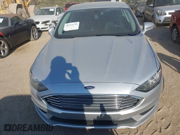 2017 Ford Fusion SE z VIN 3FA6P0H73HR236618, wystawiony jako IAAI lot #40734739 z przebiegiem 189 000 mil mil oraz . Historia ofert i sprzedaży dostępna na DreamBid. Obrazek 6.