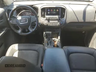2015 GMC Canyon 4WD SLE with VIN 1GTG6BE32F1115990, listed as a Copart auction lot 71295314 with 118,913 mi miles and Salvage Title. Bid and sale history available at carsss.com. Image 15.