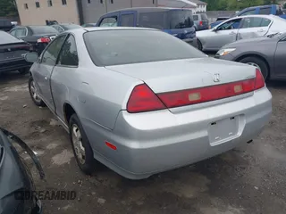 2002 Honda Accord EX z VIN 1HGCG32772A027859, wystawiony jako IAAI lot #42297494 z przebiegiem 200 623 mil mil oraz . Historia ofert i sprzedaży dostępna na DreamBid. Obrazek 3.