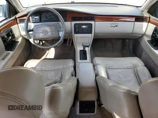 1992 Cadillac Seville z VIN 1G6KS53B0NU837105, wystawiony jako Copart lot #55865205 z przebiegiem 94 740 mil mil oraz Szkody całkowita. Historia ofert i sprzedaży dostępna na DreamBid. Obrazek 8.