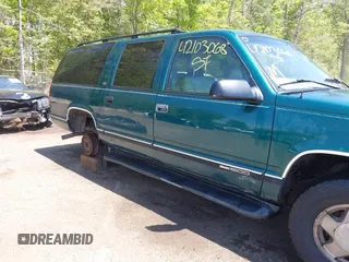 1997 GMC Suburban with VIN 3GKFK16R5VG508908, listed as a IAAI auction lot 42103068 with 264,446 mi miles and . Bid and sale history available at DreamBid. Image 6.
