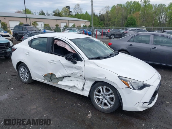 2016 Scion iA with VIN 3MYDLBZV0GY133944, listed as a IAAI auction lot 42030699 with 67,581 mi miles. Bid and sale history available at carsss.com. Image 1.