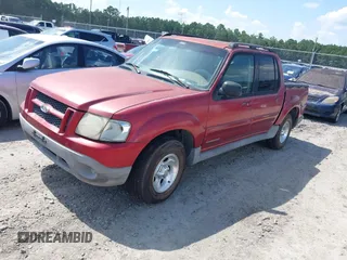 2001 Ford Explorer Sport Trac with VIN 1FMZU67E01UA93169, listed as a IAAI auction lot 42775405 with 105,897 mi miles and . Bid and sale history available at DreamBid. Image 2.