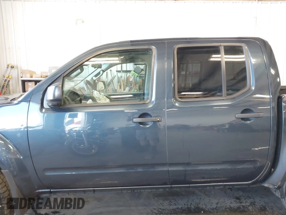 2015 Nissan Frontier Pro-4X with VIN 1N6AD0EV6FN735426, listed as a IAAI auction lot 42596253 with 183,493 mi miles and . Bid and sale history available at DreamBid. Image 15.